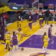 Phoenix Suns guard Devin Booker shoves Los Angeles Lakers guard Dennis Schröder to the ground in the final moments of their Game 3 playoff series.